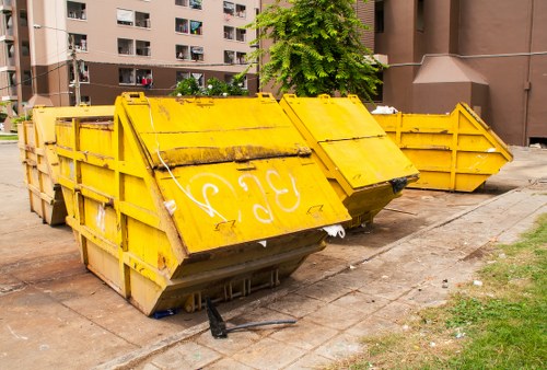 Waste removal trucks collecting trash in South East London